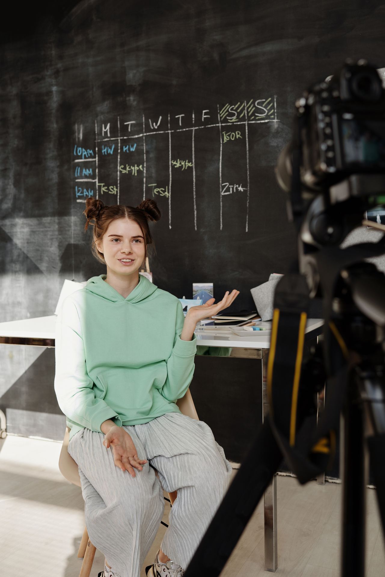 Teen content creator filming a video
